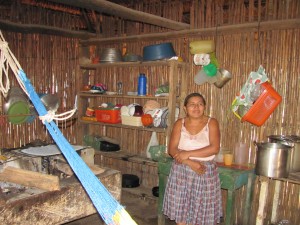 Village women inside her home