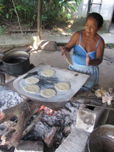 woman making tortillas