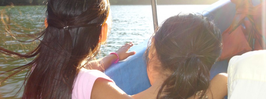 2 mayan girls headed home on boat