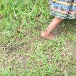 Muddy feet of Maya Q'eqch'i woman