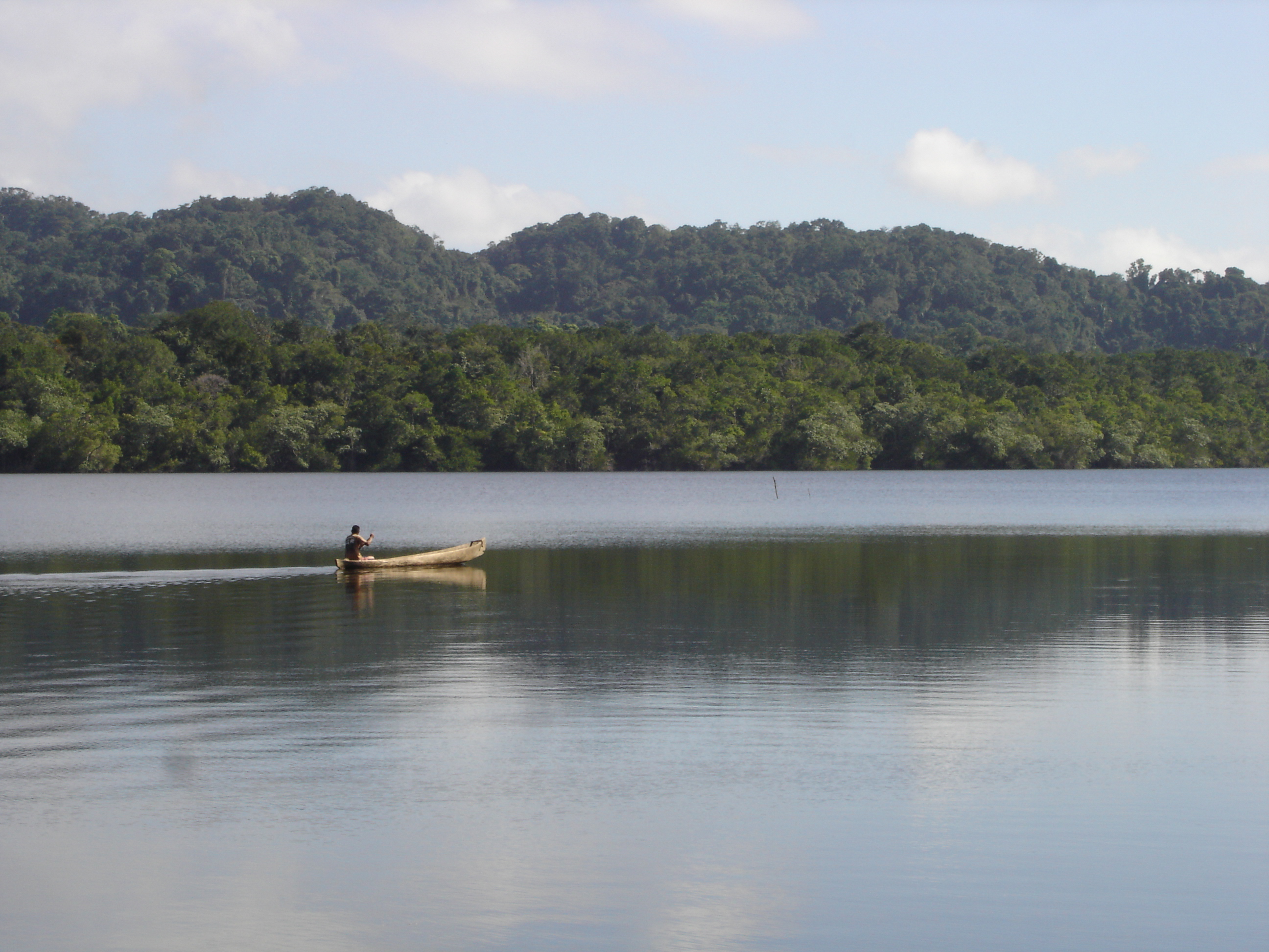 Mayan paddling cayuco near Rio Dulce